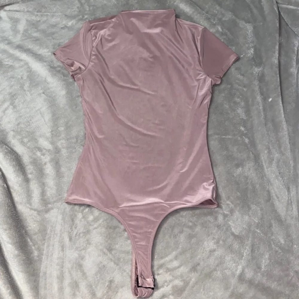 Pink bodysuit